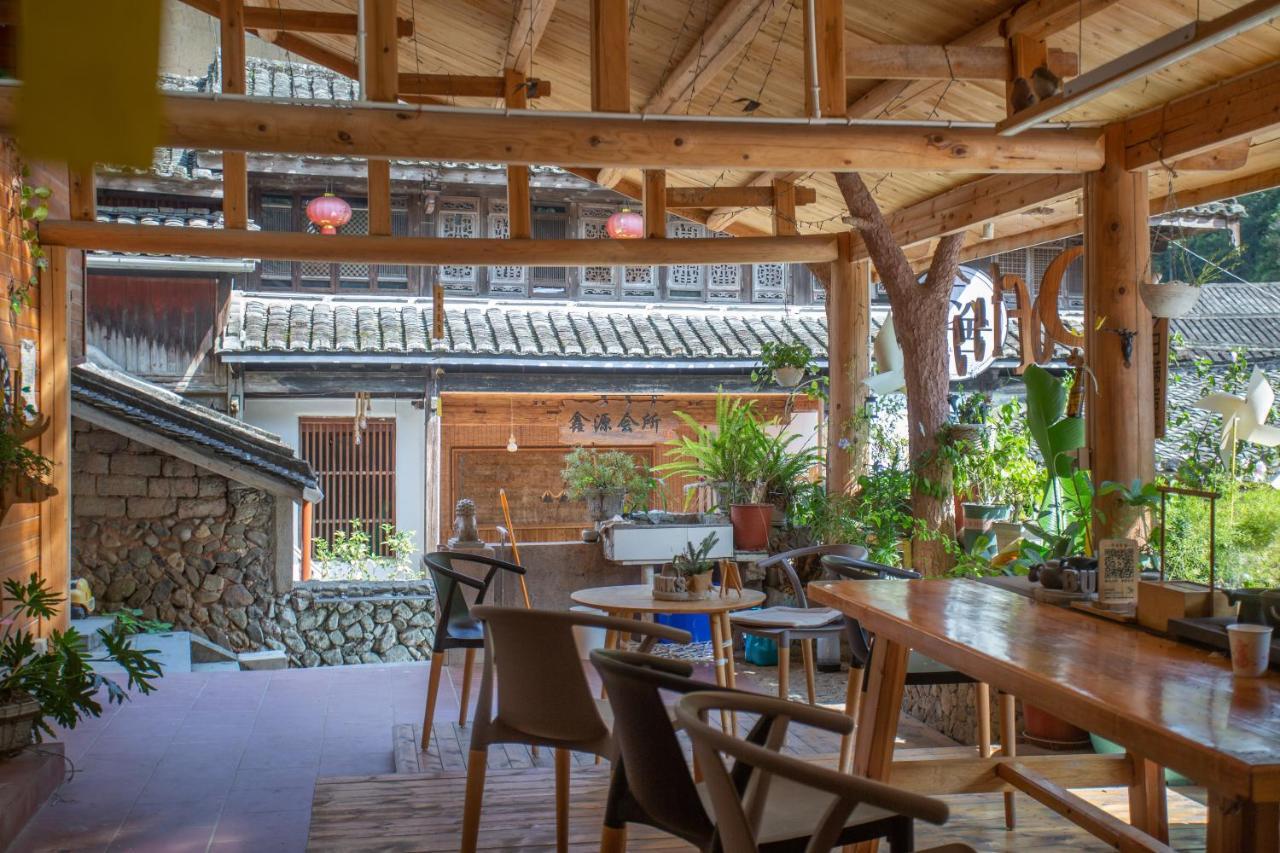 Nanjing Tulou Xinyuan HomeStay Luaran gambar