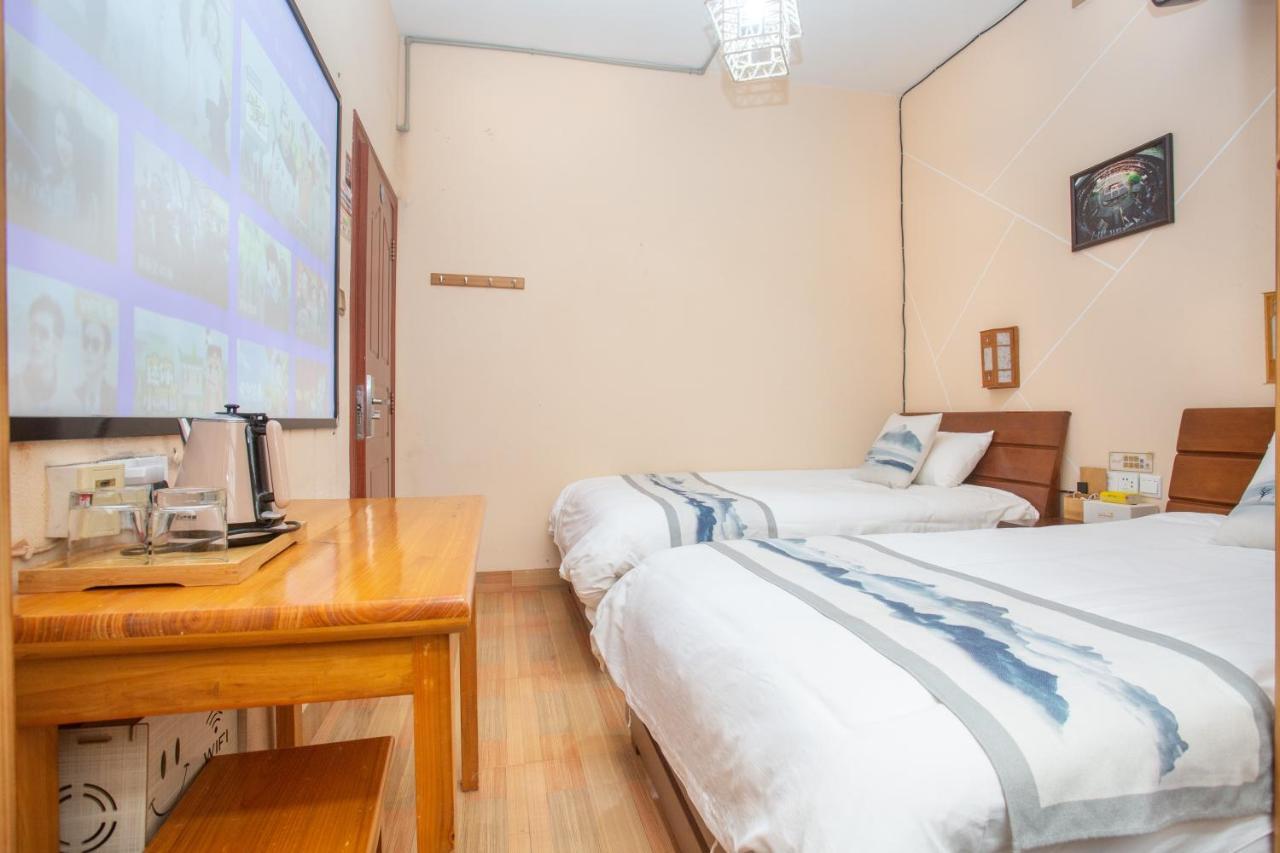Nanjing Tulou Xinyuan HomeStay Luaran gambar