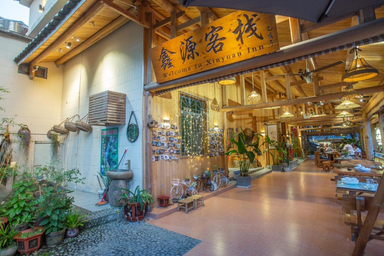 Nanjing Tulou Xinyuan HomeStay Luaran gambar