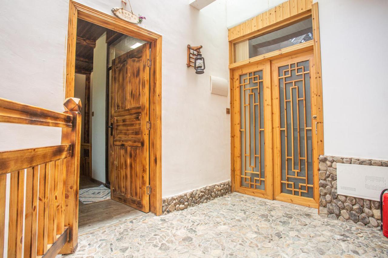 Nanjing Tulou Xinyuan HomeStay Luaran gambar