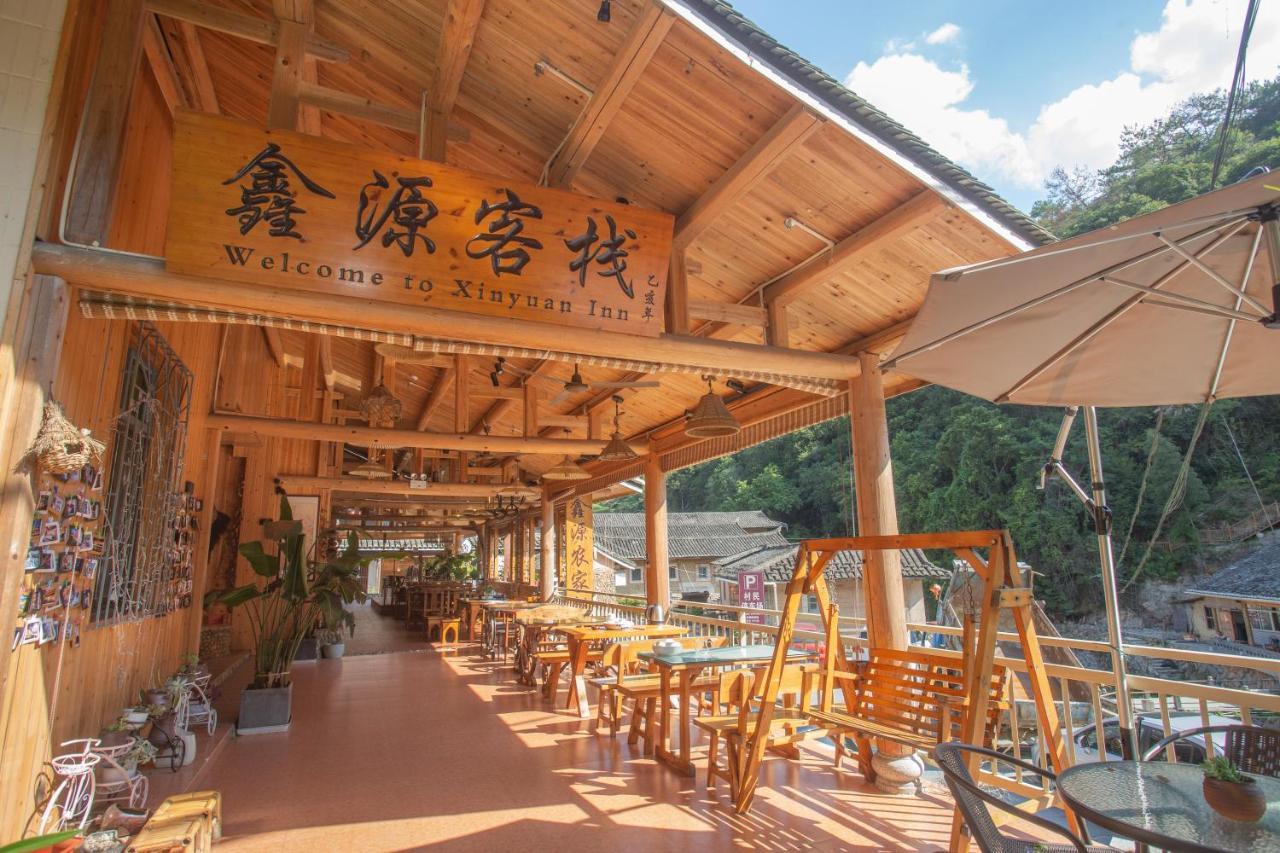 Nanjing Tulou Xinyuan HomeStay Luaran gambar