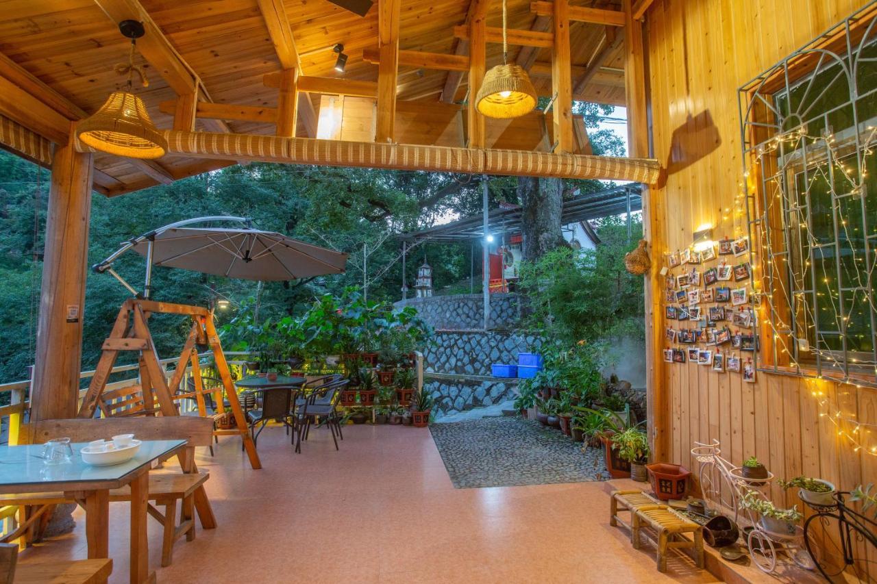Nanjing Tulou Xinyuan HomeStay Luaran gambar