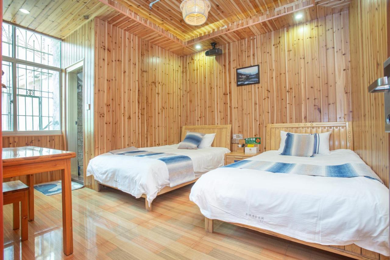 Nanjing Tulou Xinyuan HomeStay Luaran gambar