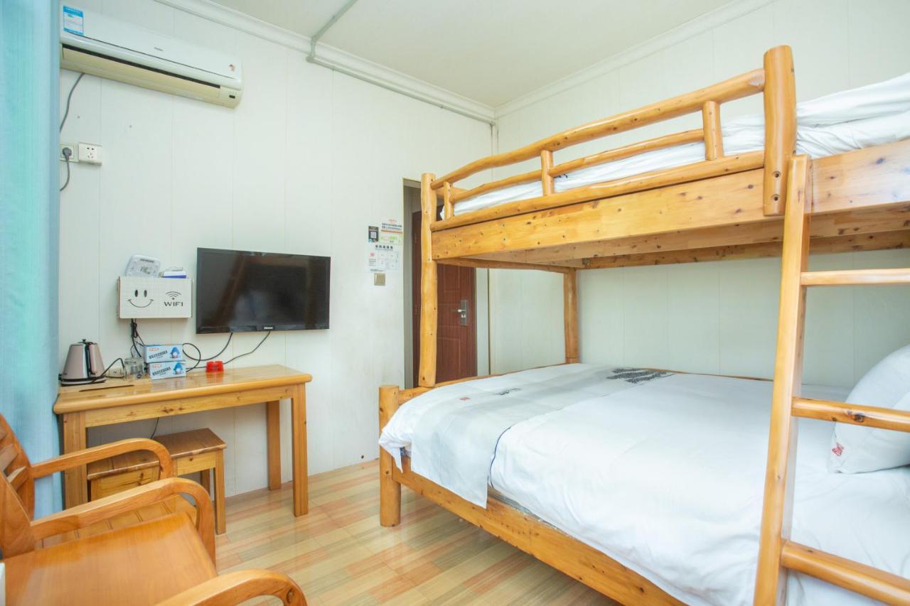 Nanjing Tulou Xinyuan HomeStay Luaran gambar