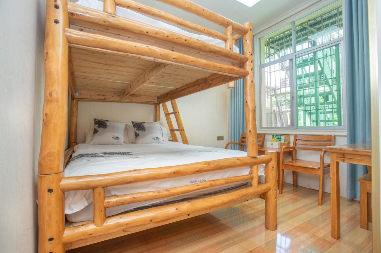 Nanjing Tulou Xinyuan HomeStay Luaran gambar