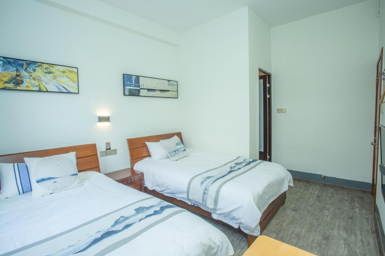 Nanjing Tulou Xinyuan HomeStay Luaran gambar