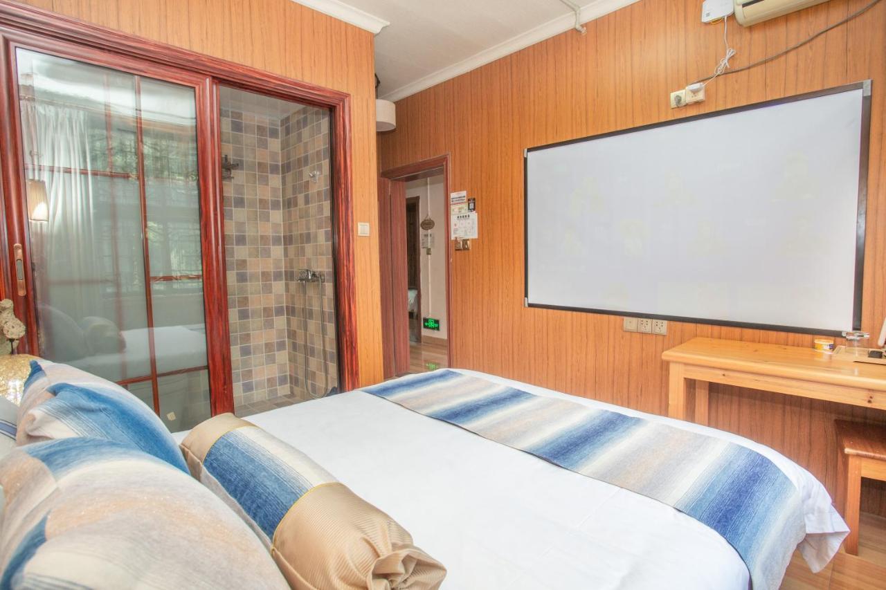 Nanjing Tulou Xinyuan HomeStay Luaran gambar