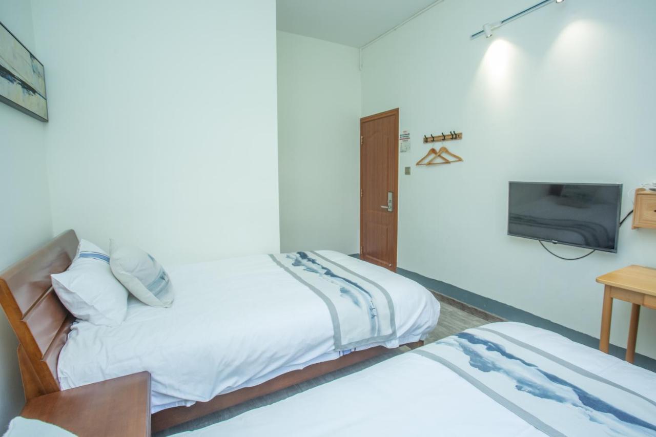 Nanjing Tulou Xinyuan HomeStay Luaran gambar