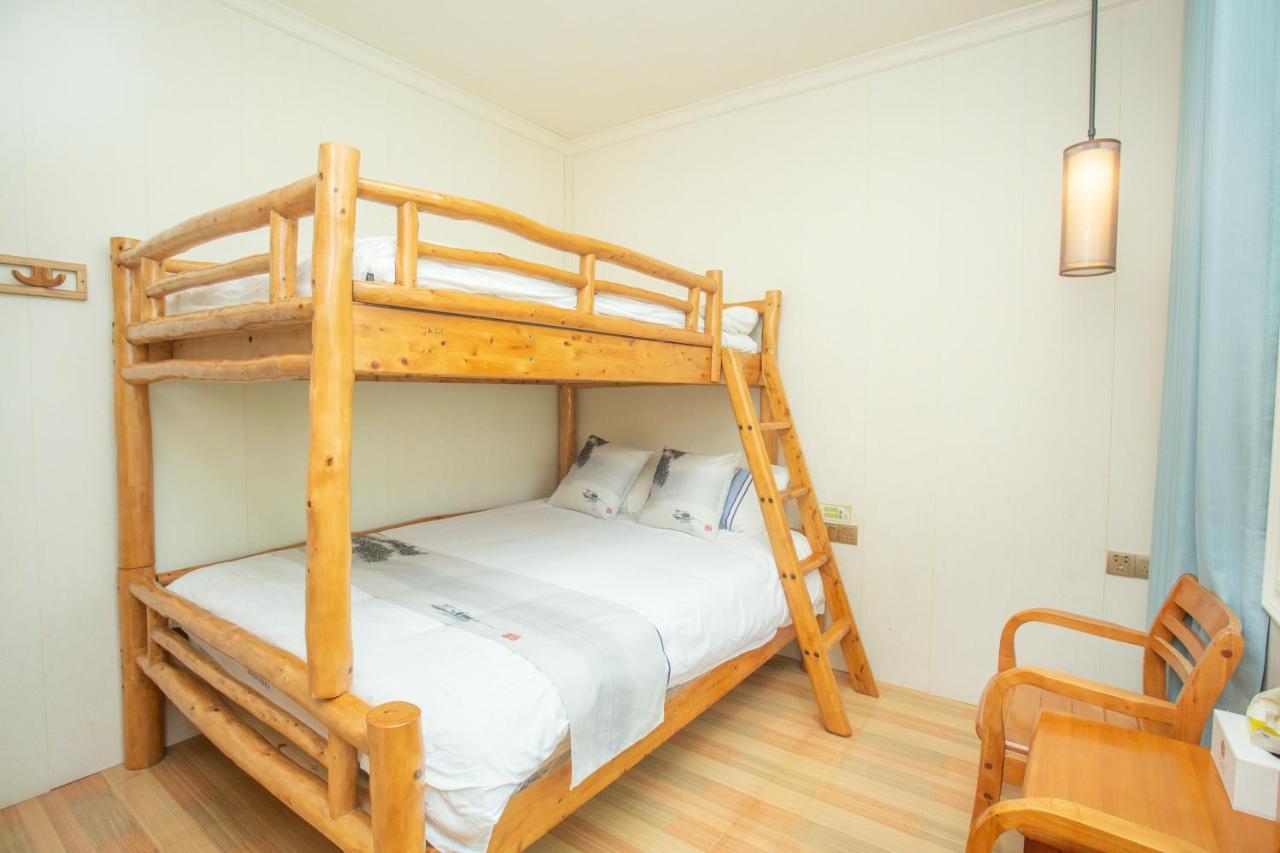 Nanjing Tulou Xinyuan HomeStay Luaran gambar