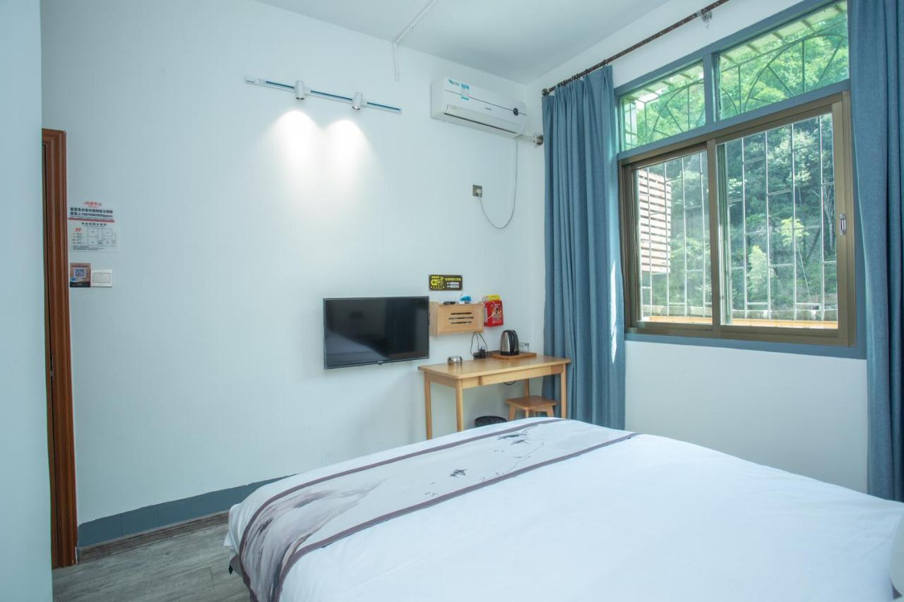 Nanjing Tulou Xinyuan HomeStay Luaran gambar