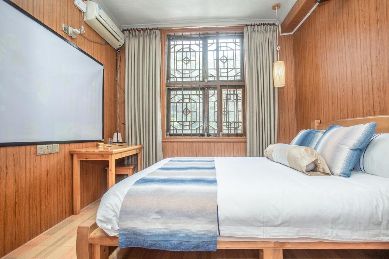 Nanjing Tulou Xinyuan HomeStay Luaran gambar