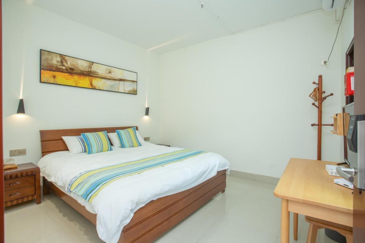 Nanjing Tulou Xinyuan HomeStay Luaran gambar
